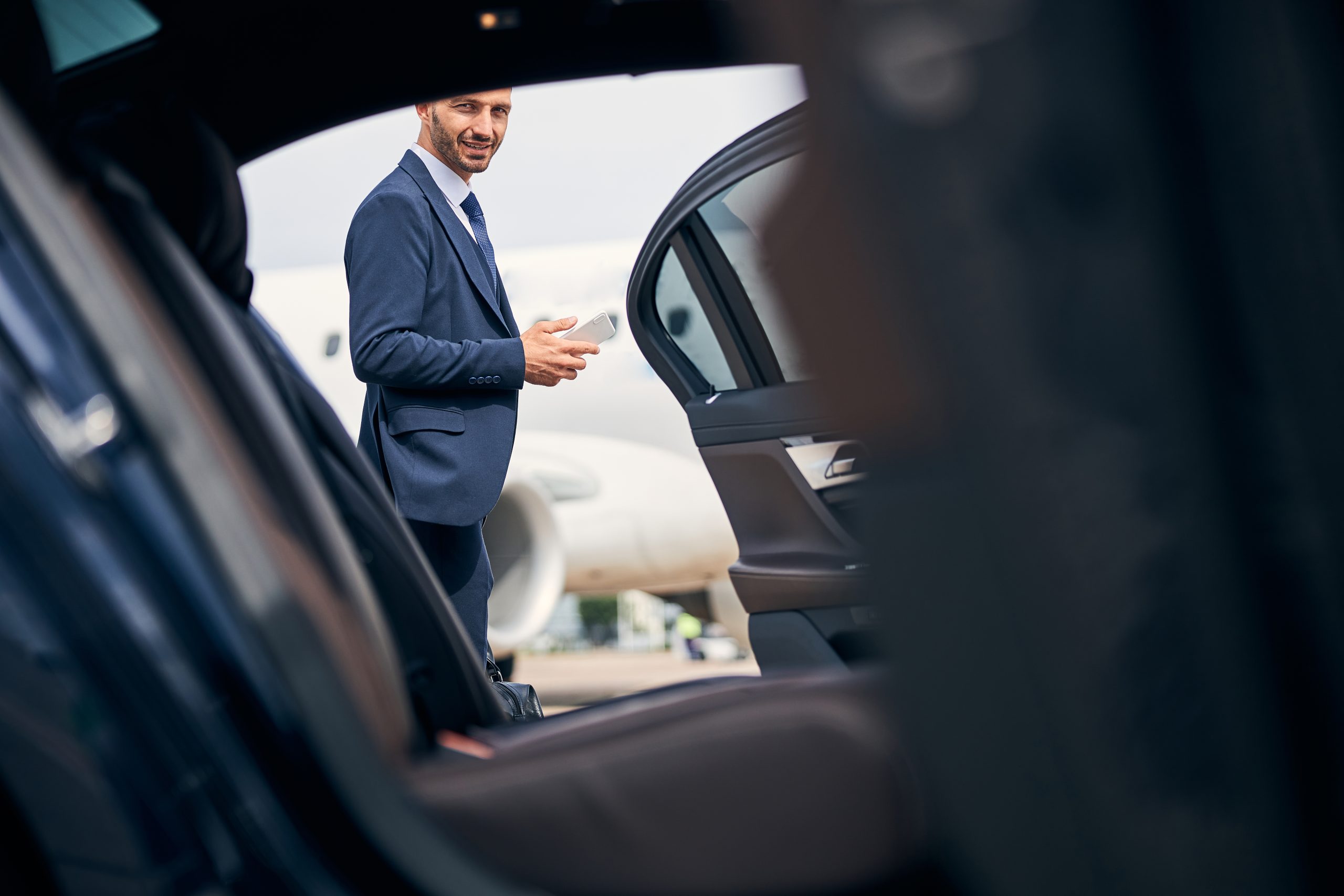 Driver opening the taxi door